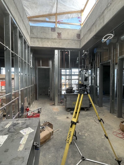 Survey equipment inside a hospital under construction